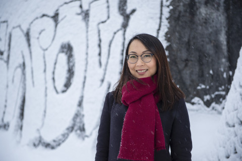 Young woman in wintery scene.